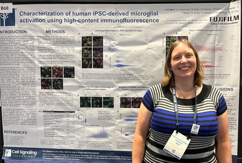 Virginia Bain of Cell Signaling Technology in front of her SfN 2024 poster